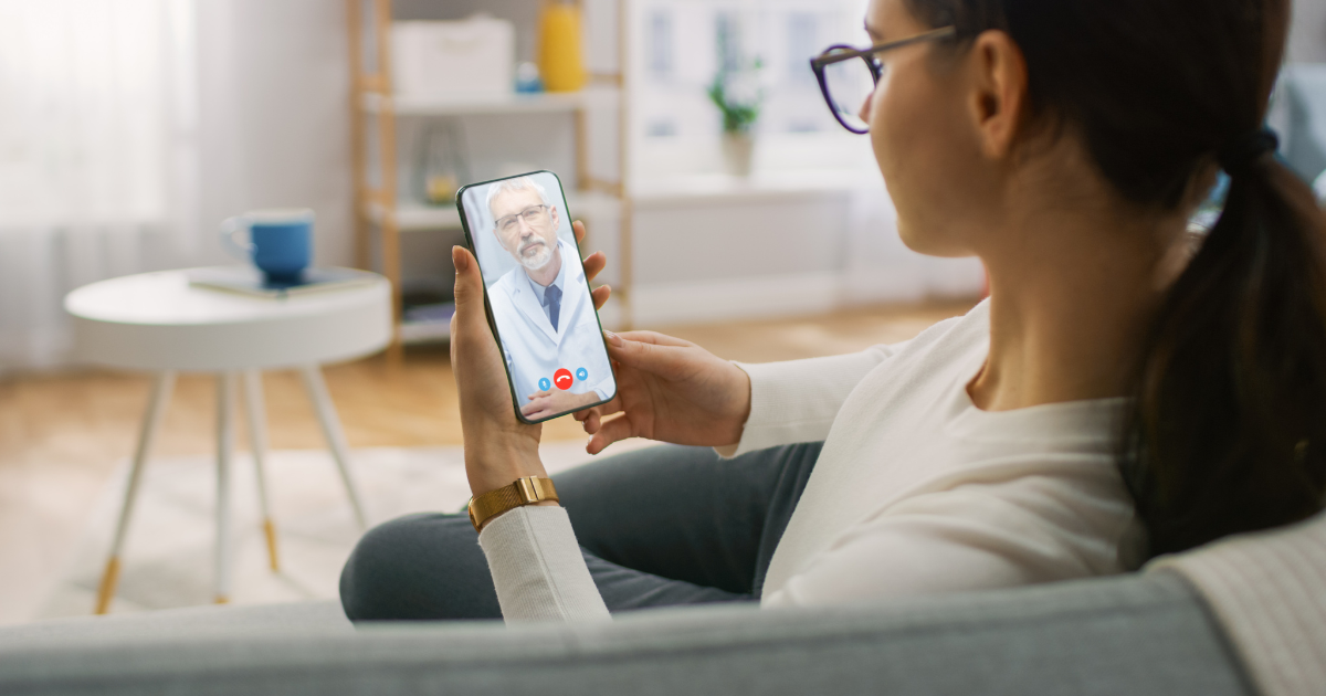 Patient using Remote Patient Observation Technology on her phone.