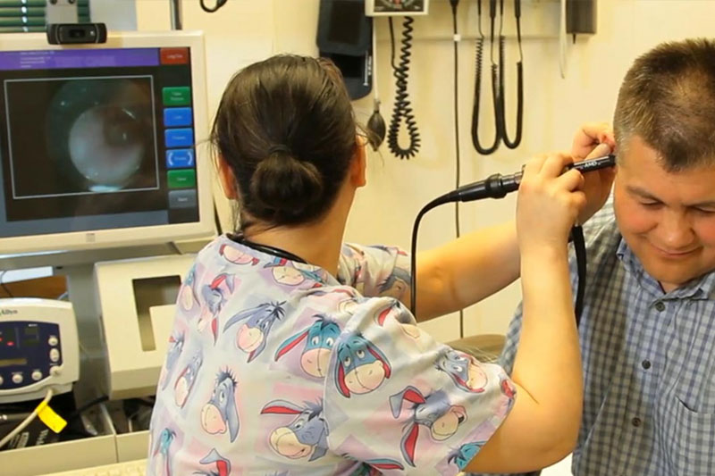 Clinic analyzing patient's ear remotely
