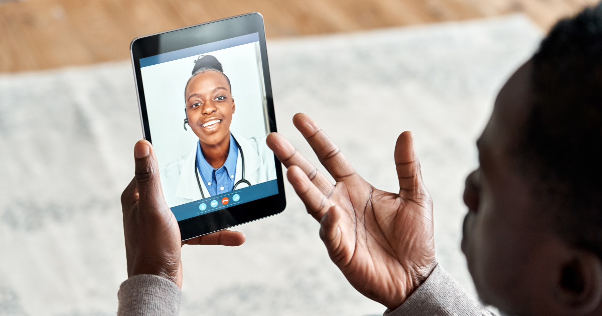 doctor and patient having a video call using a tablet. Utlizing Cost-Effective Virtual Care servcies.