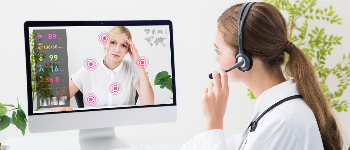 female doctor providing telehealth through virtual care platform on computer