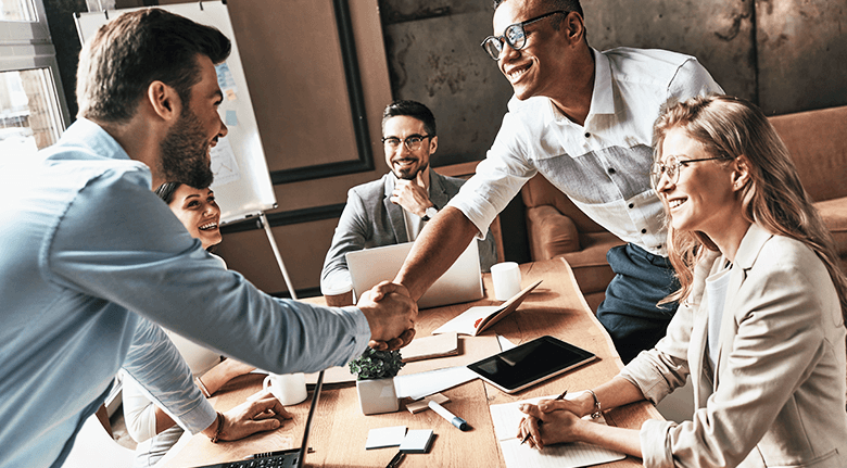 professional shaking hands with customer